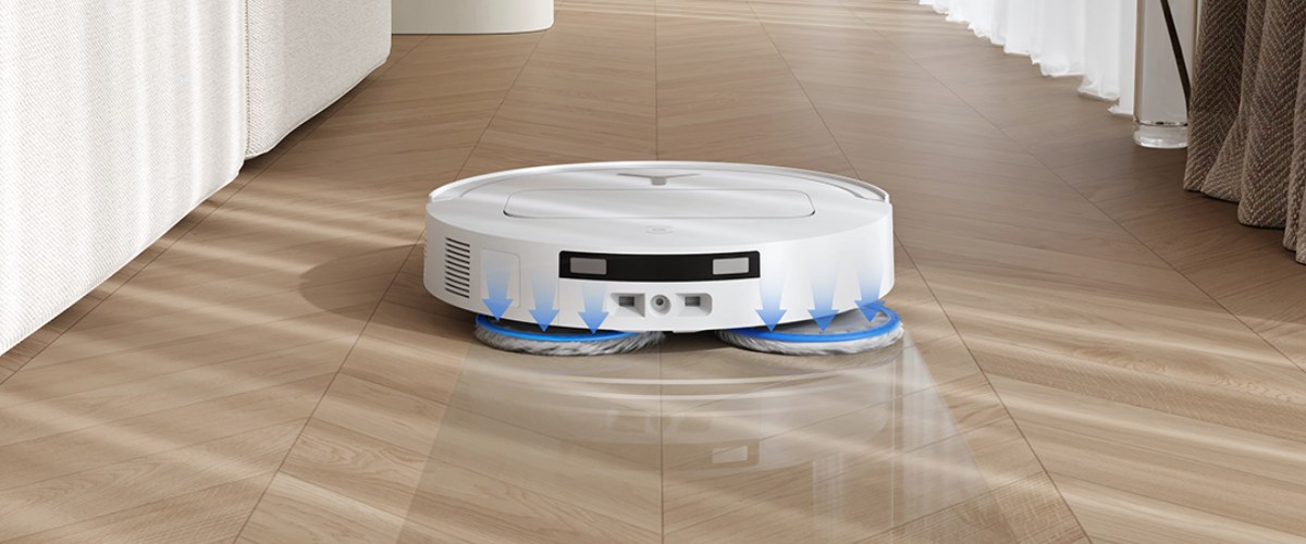 Робот-пылесос Ecovacs Deebot T50 PRO OMNI очищает пол с вращающимися швабрами